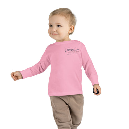 Bright Acres Bright Minds Together Toddler Long Sleeve — Pink, front on model