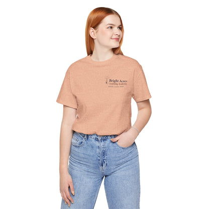 Bright Acres Bright Minds Together Adult Tee — Heather Peach, front on model