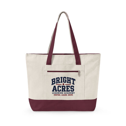 Bright Acres canvas tote in Natural/Maroon, collegiate design on front zip pocket