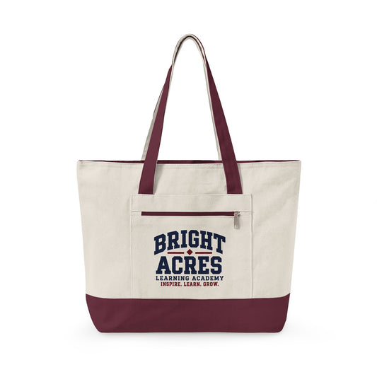 Bright Acres canvas tote in Natural/Maroon, collegiate design on front zip pocket