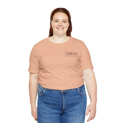 Bright Acres Bright Minds Together Adult Tee — Heather Peach, front on model