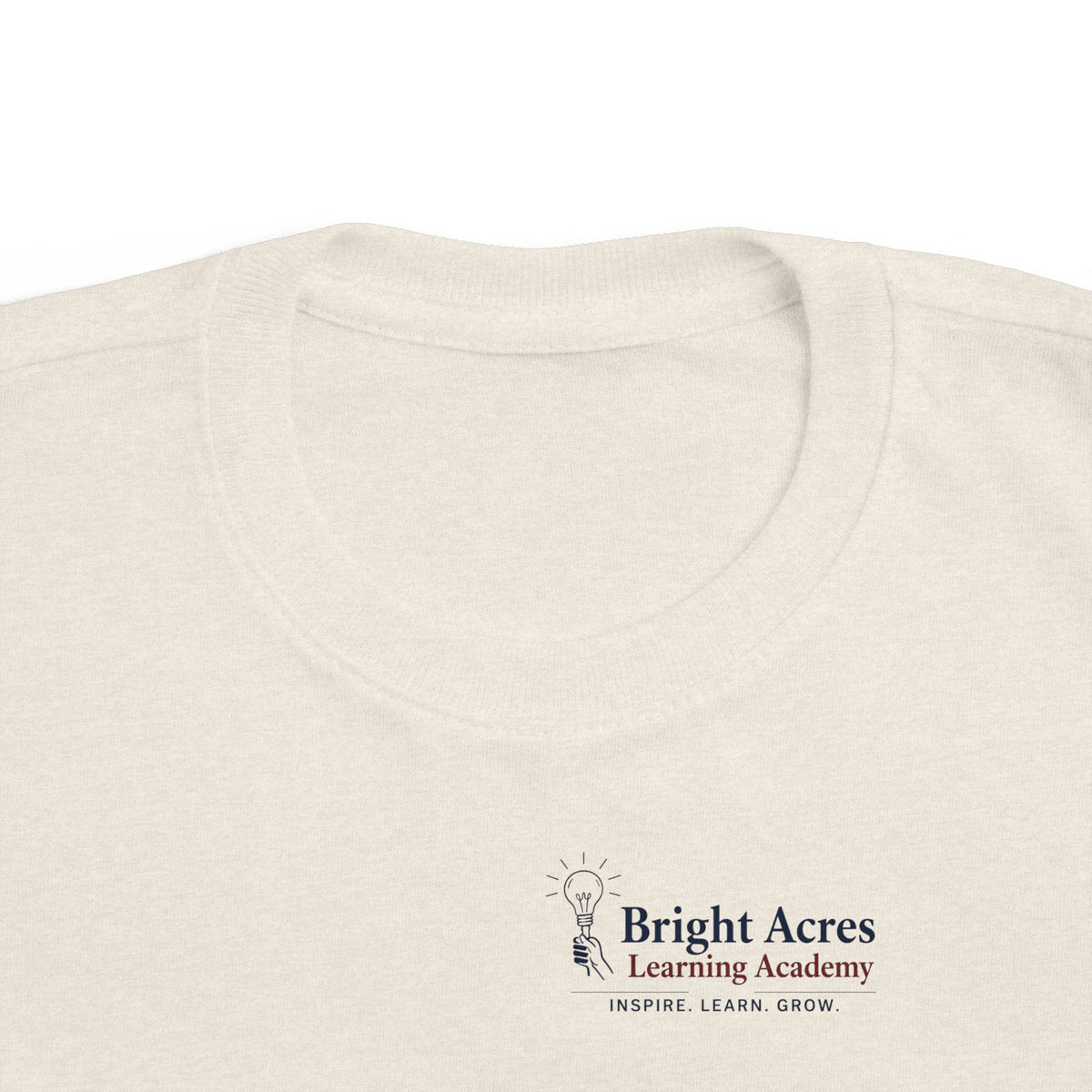 Bright Acres Little Minds Bright Futures Toddler Tee — Natural Heather, chest logo detail
