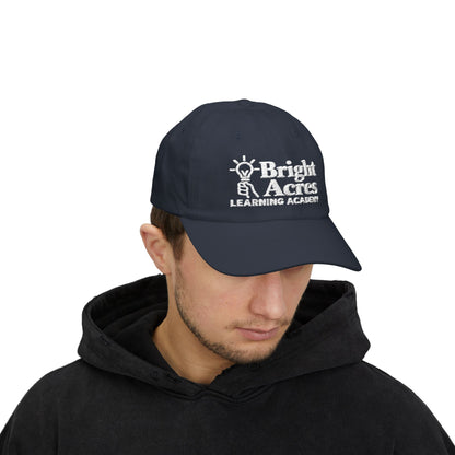 Bright Acres navy embroidered dad cap worn by an adult, front view