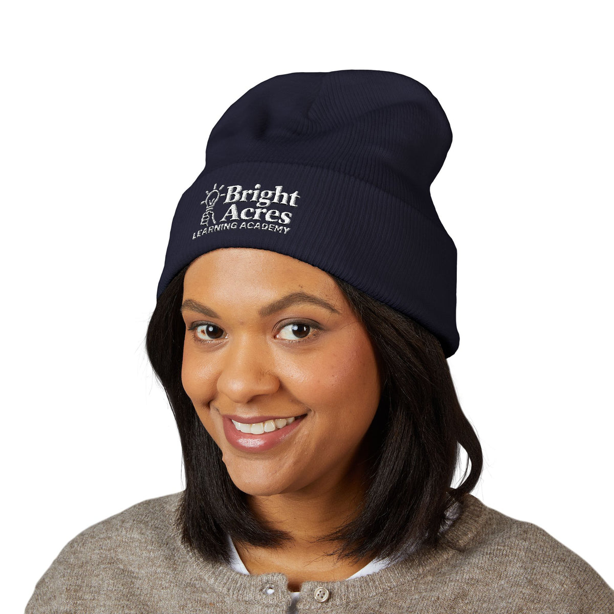 Bright Acres navy embroidered beanie worn by an adult, front view
